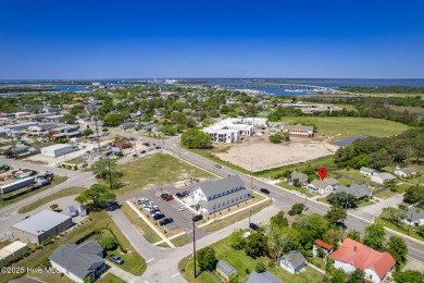 This updated, fully furnished 3-bedroom, 2-bath home in Beaufort on North River Club in North Carolina - for sale on GolfHomes.com, golf home, golf lot