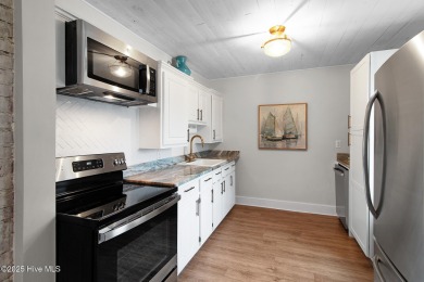 This updated, fully furnished 3-bedroom, 2-bath home in Beaufort on North River Club in North Carolina - for sale on GolfHomes.com, golf home, golf lot