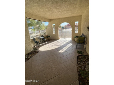 This 3 Bedroom + Den, 2 Bathroom Pool home, is perfectly located on London Bridge Golf Course in Arizona - for sale on GolfHomes.com, golf home, golf lot