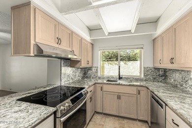 Discover this sought-after DETACHED Atrium Garden Home on Arizona Grand Resort Golf Course in Arizona - for sale on GolfHomes.com, golf home, golf lot