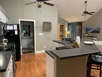 Owner has priced this charming three-bedroom, two-bath home to on Shiloh Falls Golf Club in Tennessee - for sale on GolfHomes.com, golf home, golf lot