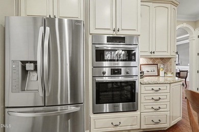 Situated on a beautifully landscaped corner lot in the on Governors Club in North Carolina - for sale on GolfHomes.com, golf home, golf lot