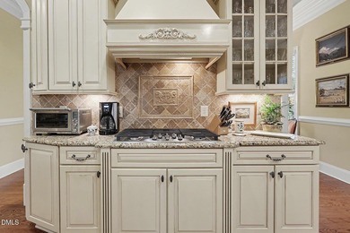 Situated on a beautifully landscaped corner lot in the on Governors Club in North Carolina - for sale on GolfHomes.com, golf home, golf lot