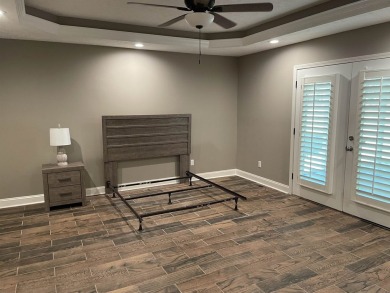 Owner has priced this charming three-bedroom, two-bath home to on Shiloh Falls Golf Club in Tennessee - for sale on GolfHomes.com, golf home, golf lot