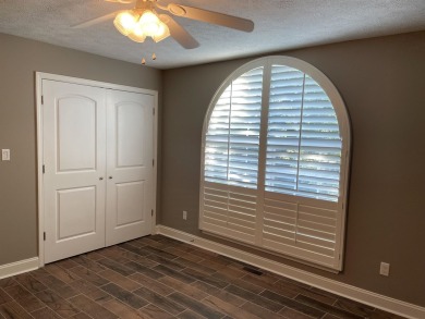 Owner has priced this charming three-bedroom, two-bath home to on Shiloh Falls Golf Club in Tennessee - for sale on GolfHomes.com, golf home, golf lot