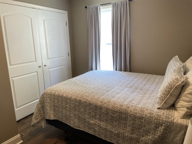 Owner has priced this charming three-bedroom, two-bath home to on Shiloh Falls Golf Club in Tennessee - for sale on GolfHomes.com, golf home, golf lot