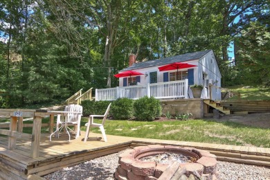 THIS COTTAGE WILL CHARM YOU RIGHT INTO THE LAKE LIFE! on  in Indiana - for sale on GolfHomes.com, golf home, golf lot