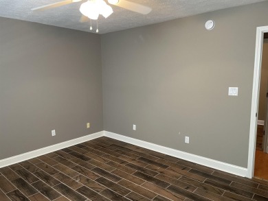 Owner has priced this charming three-bedroom, two-bath home to on Shiloh Falls Golf Club in Tennessee - for sale on GolfHomes.com, golf home, golf lot