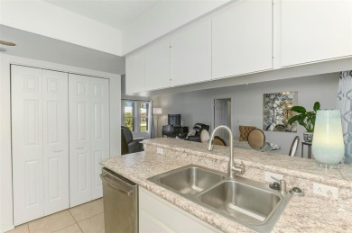 Charming 3-bedroom, 2-bathroom, canal-front home in the highly on Pinemoor West Golf Club in Florida - for sale on GolfHomes.com, golf home, golf lot
