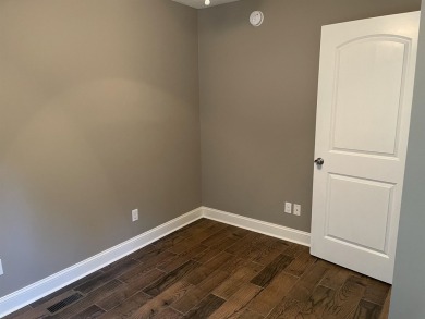 Owner has priced this charming three-bedroom, two-bath home to on Shiloh Falls Golf Club in Tennessee - for sale on GolfHomes.com, golf home, golf lot