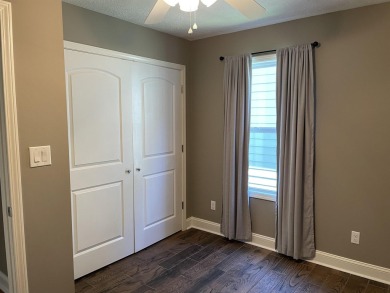 Owner has priced this charming three-bedroom, two-bath home to on Shiloh Falls Golf Club in Tennessee - for sale on GolfHomes.com, golf home, golf lot