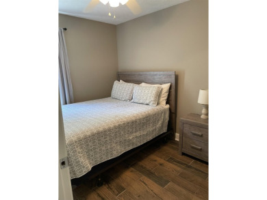 Owner has priced this charming three-bedroom, two-bath home to on Shiloh Falls Golf Club in Tennessee - for sale on GolfHomes.com, golf home, golf lot