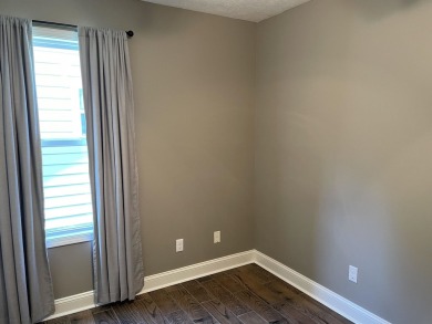 Owner has priced this charming three-bedroom, two-bath home to on Shiloh Falls Golf Club in Tennessee - for sale on GolfHomes.com, golf home, golf lot