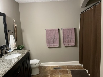 Owner has priced this charming three-bedroom, two-bath home to on Shiloh Falls Golf Club in Tennessee - for sale on GolfHomes.com, golf home, golf lot
