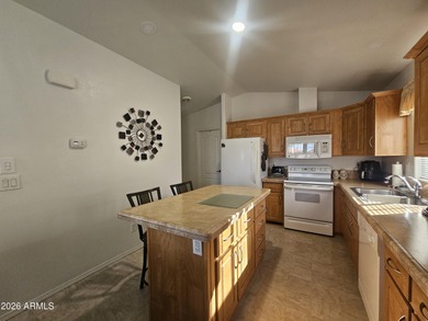 This 1BD 1.5BA home boasts an open floor plan, stunning sunset on Viewpoint Golf Resort in Arizona - for sale on GolfHomes.com, golf home, golf lot