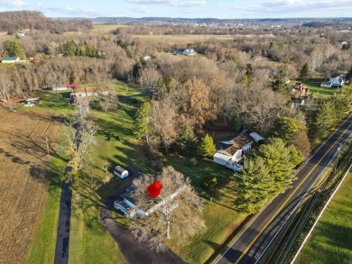 This charming 4-bedroom, 2-bath ranch home is located on 0.63 on Lancaster Country Club in Ohio - for sale on GolfHomes.com, golf home, golf lot