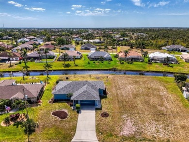 Charming 3-bedroom, 2-bathroom, canal-front home in the highly on Pinemoor West Golf Club in Florida - for sale on GolfHomes.com, golf home, golf lot