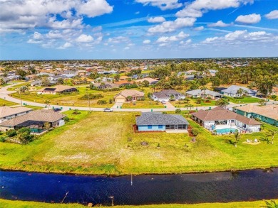Charming 3-bedroom, 2-bathroom, canal-front home in the highly on Pinemoor West Golf Club in Florida - for sale on GolfHomes.com, golf home, golf lot