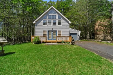 Step into this bright and beautifully styled 3-bedroom, 2-bath on Pocono Farms Country Club in Pennsylvania - for sale on GolfHomes.com, golf home, golf lot