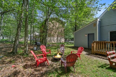 Step into this bright and beautifully styled 3-bedroom, 2-bath on Pocono Farms Country Club in Pennsylvania - for sale on GolfHomes.com, golf home, golf lot