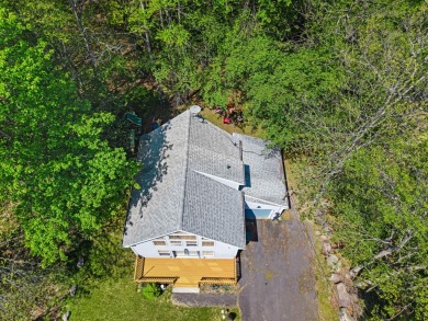 Step into this bright and beautifully styled 3-bedroom, 2-bath on Pocono Farms Country Club in Pennsylvania - for sale on GolfHomes.com, golf home, golf lot
