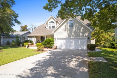 Welcome to your serene retreat in the sought-after beach town of on Oyster Bay Golf Links in North Carolina - for sale on GolfHomes.com, golf home, golf lot
