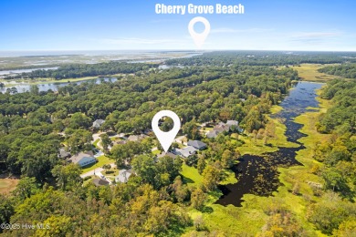 Welcome to your serene retreat in the sought-after beach town of on Oyster Bay Golf Links in North Carolina - for sale on GolfHomes.com, golf home, golf lot