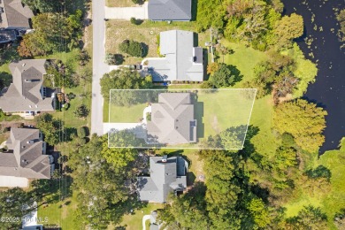 Welcome to your serene retreat in the sought-after beach town of on Oyster Bay Golf Links in North Carolina - for sale on GolfHomes.com, golf home, golf lot