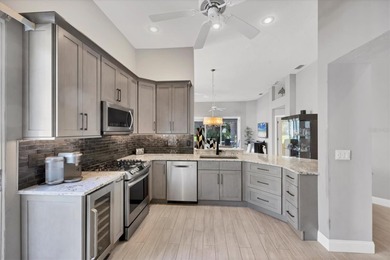 Under contract-accepting backup offers. This move-in ready on University Park Country Club in Florida - for sale on GolfHomes.com, golf home, golf lot