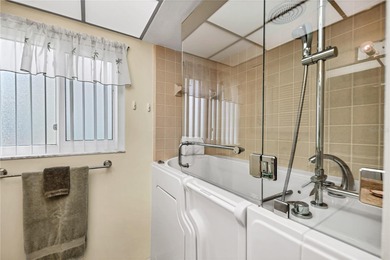 This is an exceptional and rarely available first floor on IMG Academies Golf and Country Club in Florida - for sale on GolfHomes.com, golf home, golf lot