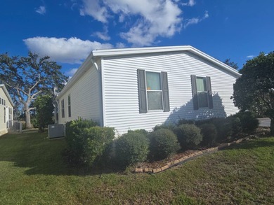 This 1500'+ 2 Bdrm + office/den is priced to sell--$80's. Open on Southport Springs Golf Club in Florida - for sale on GolfHomes.com, golf home, golf lot