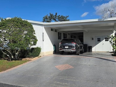 This 1500'+ 2 Bdrm + office/den is priced to sell--$80's. Open on Southport Springs Golf Club in Florida - for sale on GolfHomes.com, golf home, golf lot