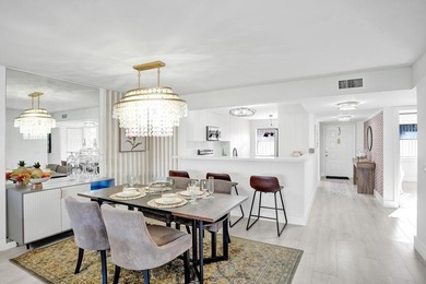 Stunning fully remodeled 1,370 SF first-floor residence blending on Sunrise Lakes Phase IV Golf Course in Florida - for sale on GolfHomes.com, golf home, golf lot