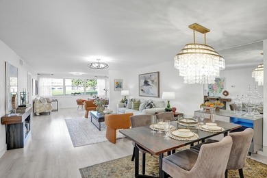 Stunning fully remodeled 1,370 SF first-floor residence blending on Sunrise Lakes Phase IV Golf Course in Florida - for sale on GolfHomes.com, golf home, golf lot