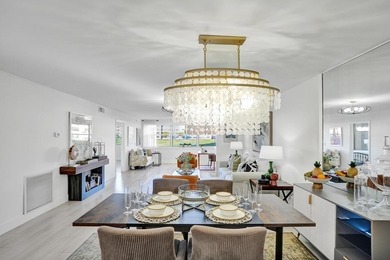 Stunning fully remodeled 1,370 SF first-floor residence blending on Sunrise Lakes Phase IV Golf Course in Florida - for sale on GolfHomes.com, golf home, golf lot