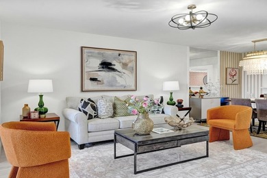 Stunning fully remodeled 1,370 SF first-floor residence blending on Sunrise Lakes Phase IV Golf Course in Florida - for sale on GolfHomes.com, golf home, golf lot