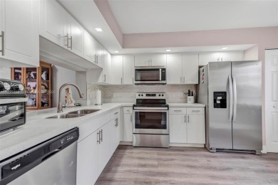 Move-in ready 55+ 2/2.The modern kitchen boasts stainless steel on Flamingo Lakes Country Club in Florida - for sale on GolfHomes.com, golf home, golf lot