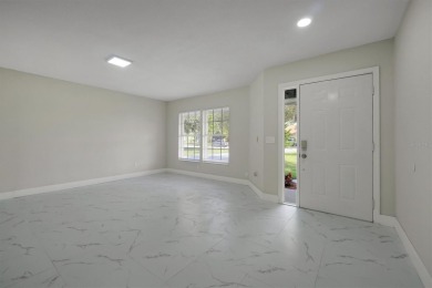 Renovated and Ready for You! This beautifully updated one-story on Wedgefield Golf Club in Florida - for sale on GolfHomes.com, golf home, golf lot