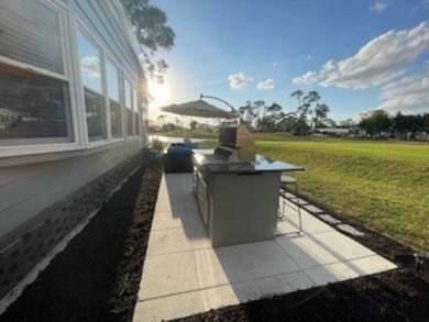 Stunning view from this home on the eleventh tee box of the Golf on Lake Fairways Country Club in Florida - for sale on GolfHomes.com, golf home, golf lot