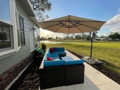 Stunning view from this home on the eleventh tee box of the Golf on Lake Fairways Country Club in Florida - for sale on GolfHomes.com, golf home, golf lot