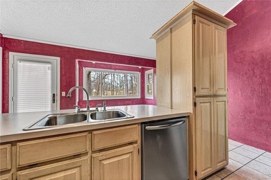 Welcome to this single level, well-maintained Bella Vista home on Branchwood Golf Course in Arkansas - for sale on GolfHomes.com, golf home, golf lot