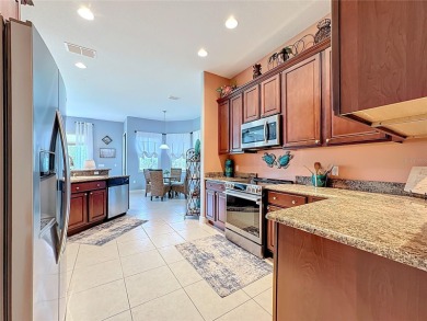 EXCELLENTLY MAINTAINED COCONUT GROVE model built in 2011 in the on Stonegate Golf Club in Florida - for sale on GolfHomes.com, golf home, golf lot
