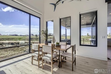 Welcome to elevated Colorado living at its finest. Perched above on Raindance National Golf Course in Colorado - for sale on GolfHomes.com, golf home, golf lot
