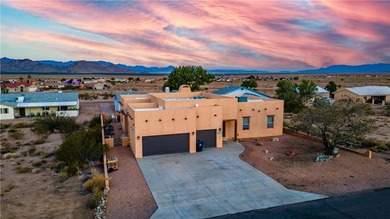 This HOME has majestic panoramic views of the Cerbat, Hualapai on Valle Vista Golf Course in Arizona - for sale on GolfHomes.com, golf home, golf lot