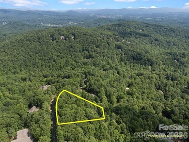 Nestled on 1.2 wooded acres in the gated Kenmure community, this on Kenmure Country Club in North Carolina - for sale on GolfHomes.com, golf home, golf lot