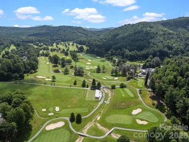 Nestled on 1.2 wooded acres in the gated Kenmure community, this on Kenmure Country Club in North Carolina - for sale on GolfHomes.com, golf home, golf lot