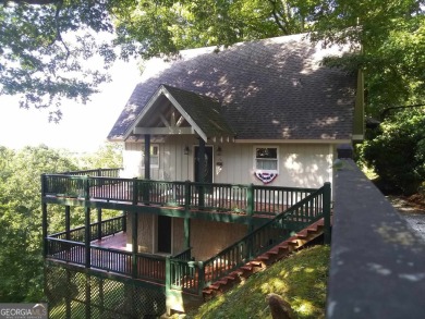 The most adorable, all wood, cabin with a magnificent view in on Sky Valley Resort and Country Club in Georgia - for sale on GolfHomes.com, golf home, golf lot