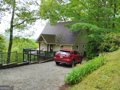 The most adorable, all wood, cabin with a magnificent view in on Sky Valley Resort and Country Club in Georgia - for sale on GolfHomes.com, golf home, golf lot