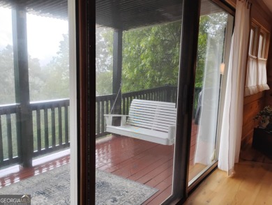 The most adorable, all wood, cabin with a magnificent view in on Sky Valley Resort and Country Club in Georgia - for sale on GolfHomes.com, golf home, golf lot