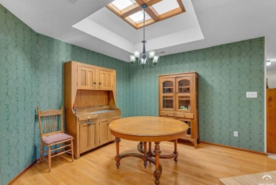 Unique open floor plan.  Living room featuring a vaulted ceiling on Alvamar Country Club in Kansas - for sale on GolfHomes.com, golf home, golf lot